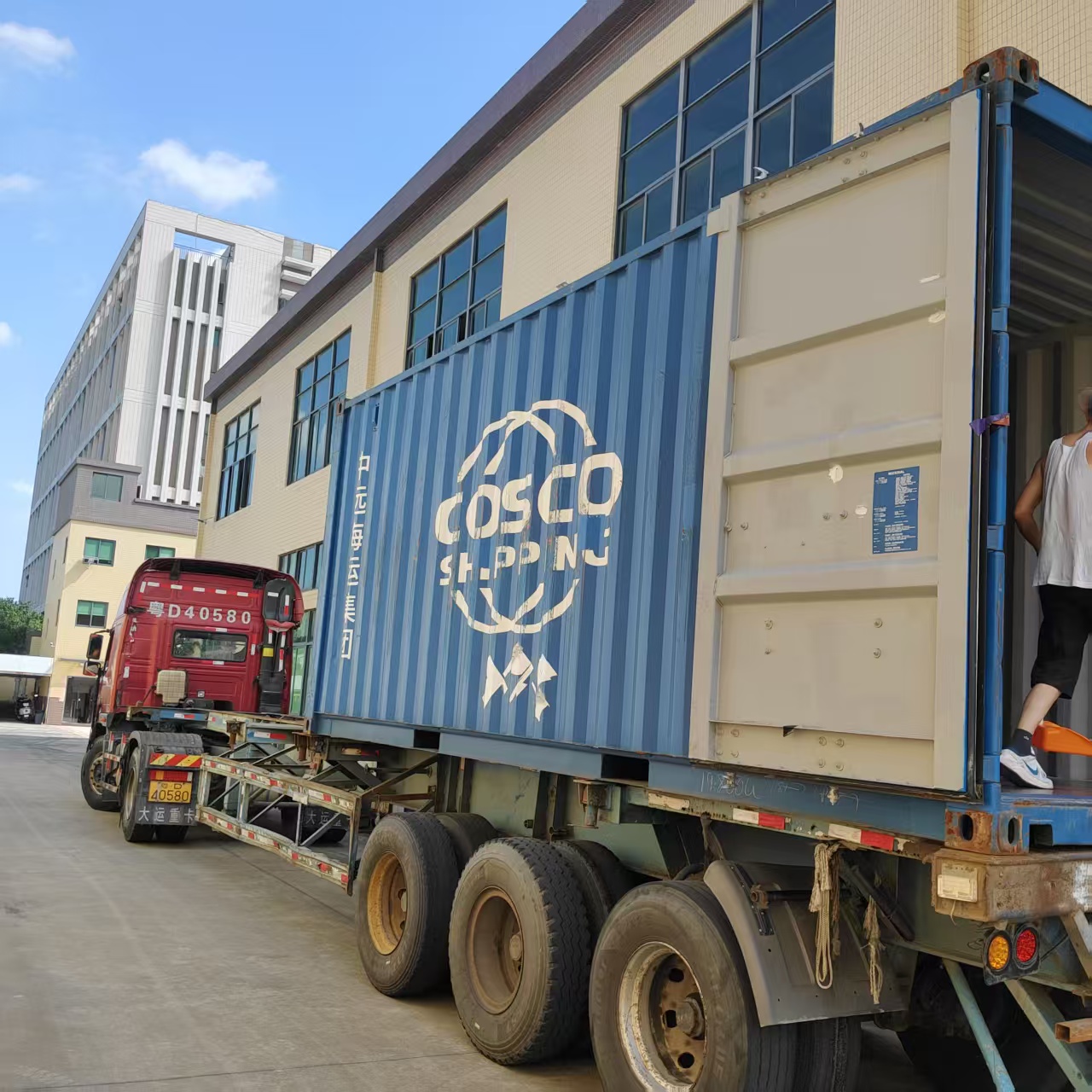 Container and truck at the factory