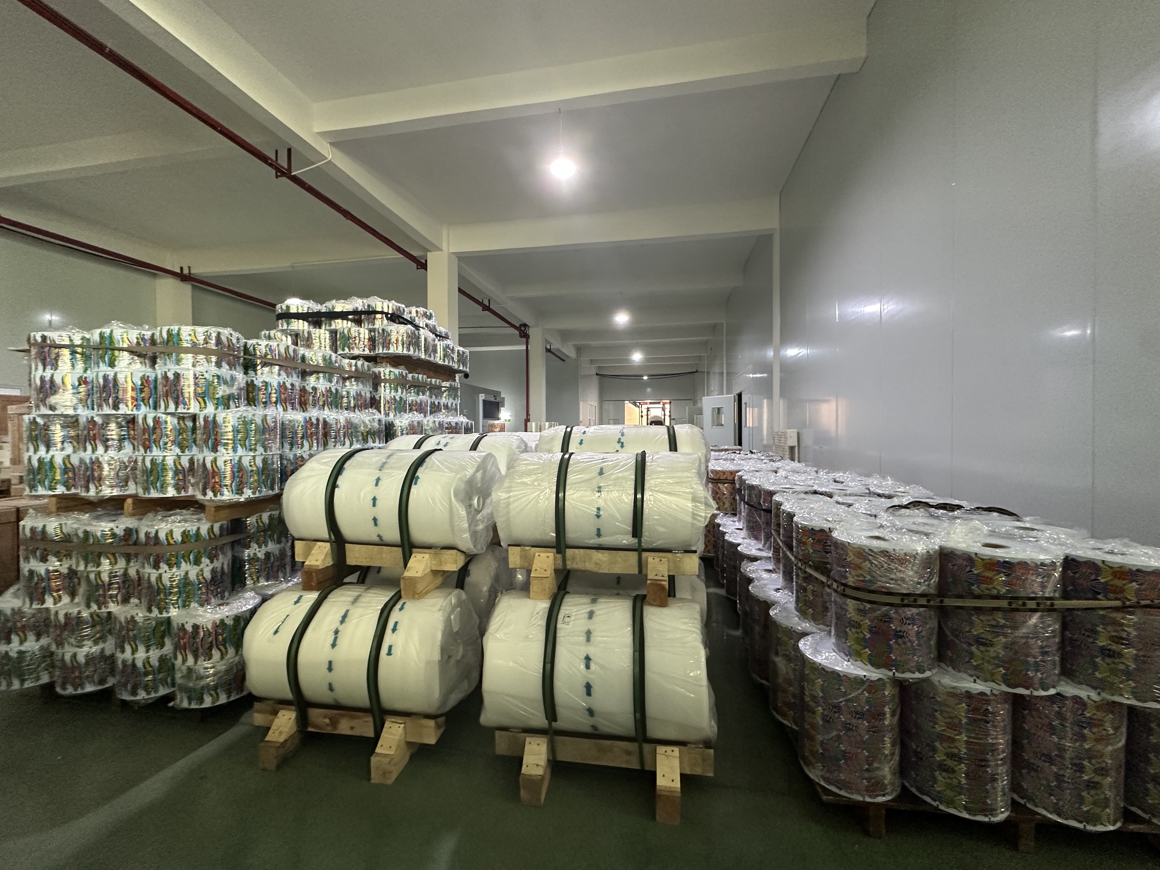 Produced rollstock stored in the warehouse, ready to ship to Indonesia